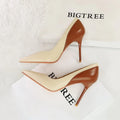 Retro colour block stiletto heel pumps for women in black and creamy-white with pointed toe