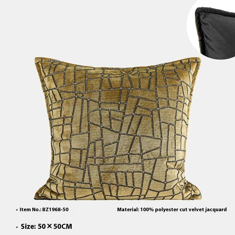 Geometric abstract pattern decorative cushion cover in gold polyester velvet fabric.