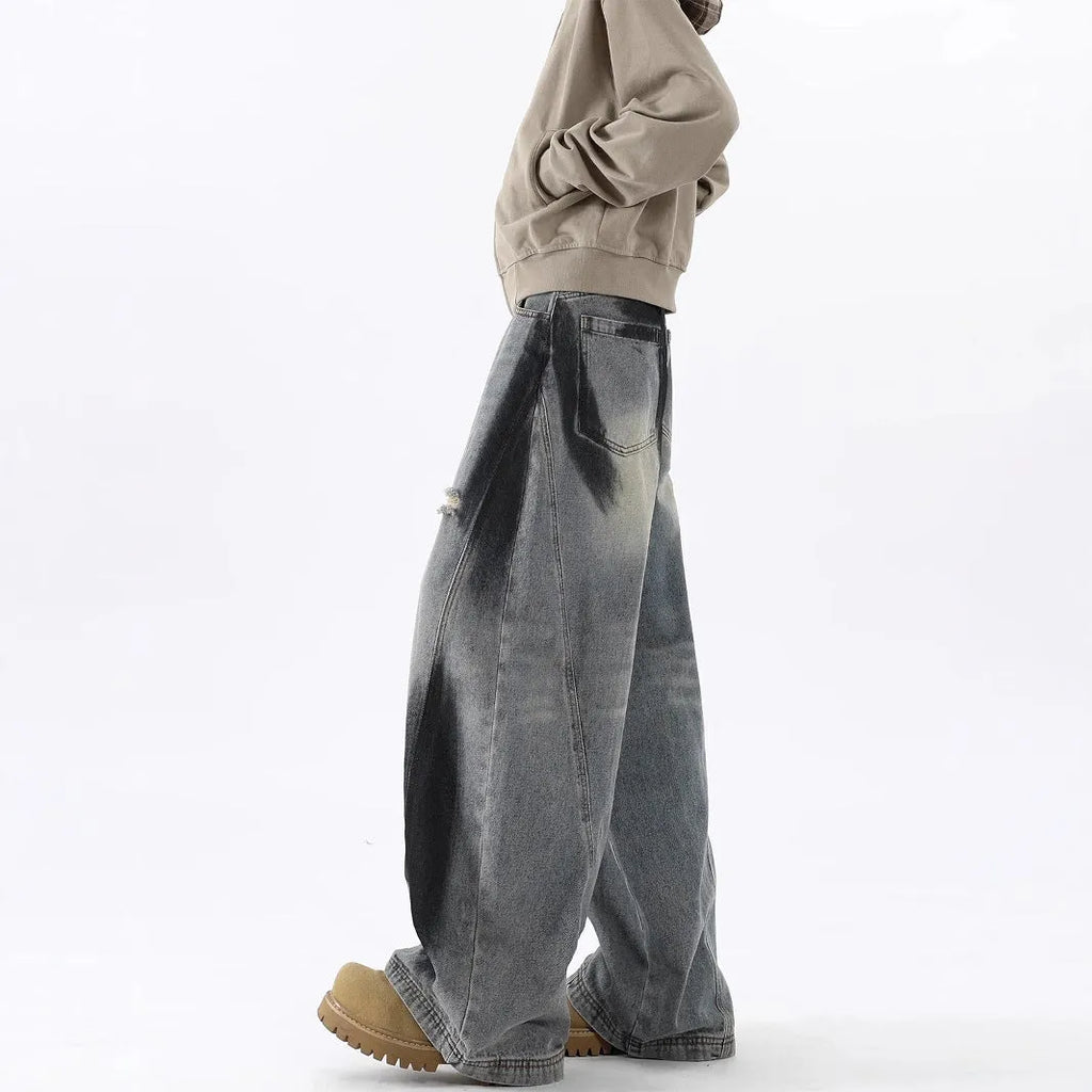 Men's blue American-style splash-ink ripped machete cotton jeans with micro elasticity