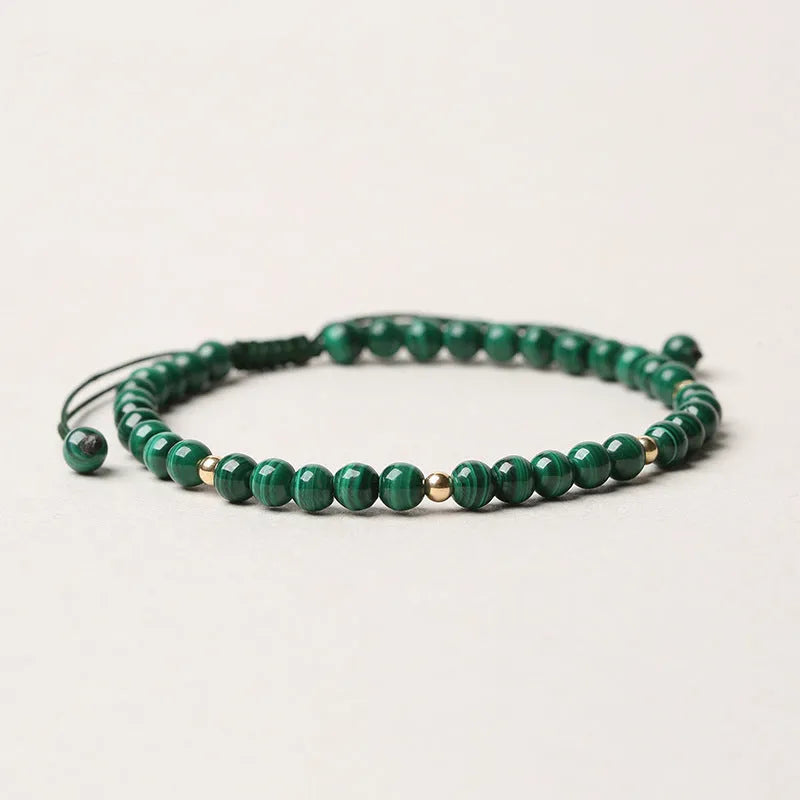 Natural malachite crystal bracelet for women with hand woven golden balls and textured stone beads