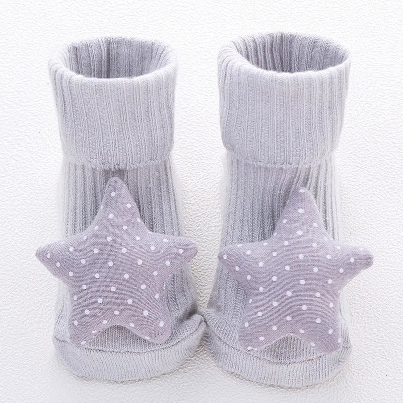 Cotton baby floor socks in multiple patterns including blue bow and lion designs