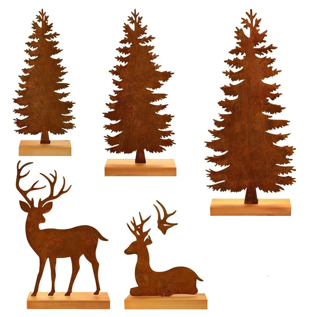 Three rusty metal Christmas decorations with elk and tree designs on white background