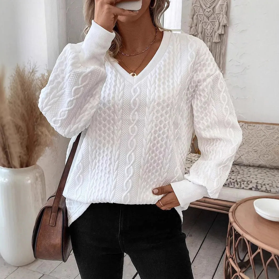 Milk white loose fit long sleeve t-shirt with a subtle 3D pattern on a casual model