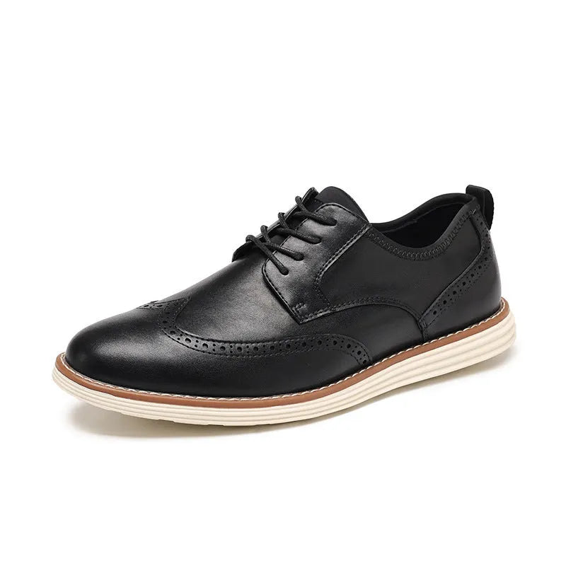 Men's black and brown slip-on business casual shoes with round toe and carved pattern detail