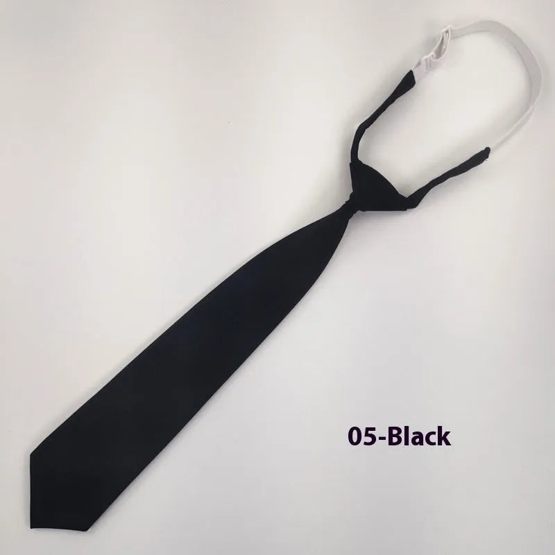 Navy blue cotton bow tie with arrow style design measuring 35cm by 7cm