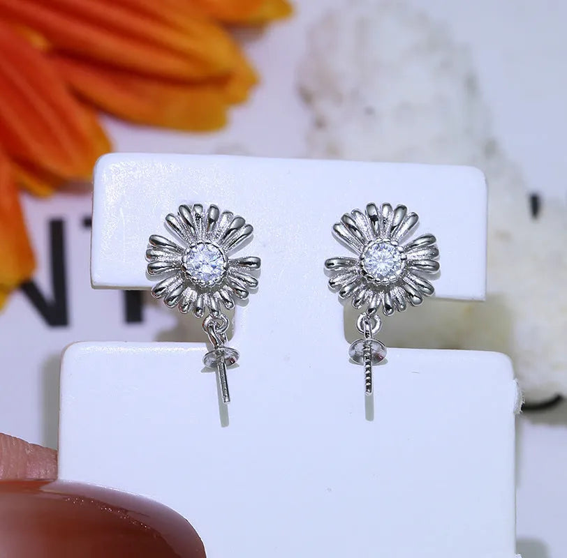 A pair of baroque-style flower earring frames in S925 sterling silver, shown in gold and silver colour options.