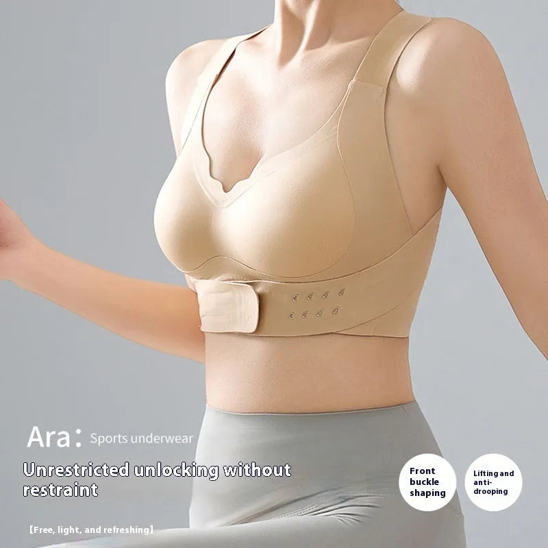 Women's front buckle sports bra in black, shown on a mannequin, featuring double shoulder straps and a 3/4 cup.