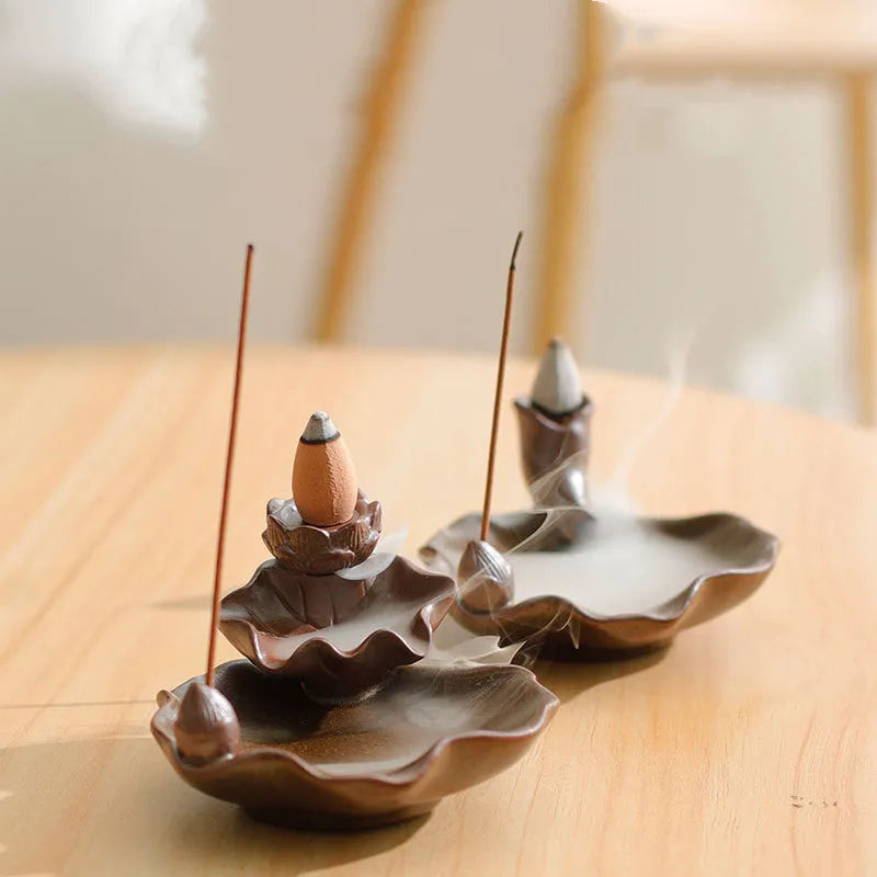 Square purple clay ceramic reverse flow incense burner with crystal glaze, featuring lotus and plum blossom designs.