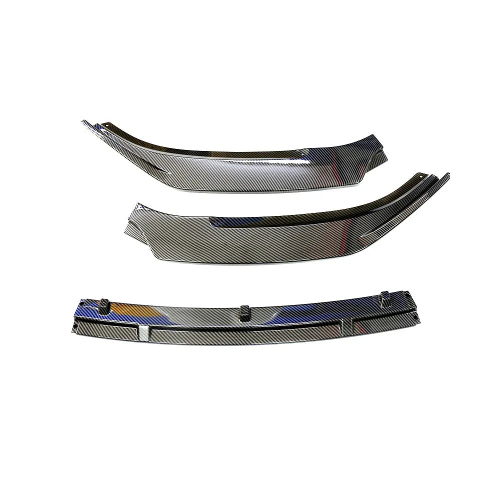 Audi A1 8X front splitter retrofit kit with three-section design in black Unksera pattern.
