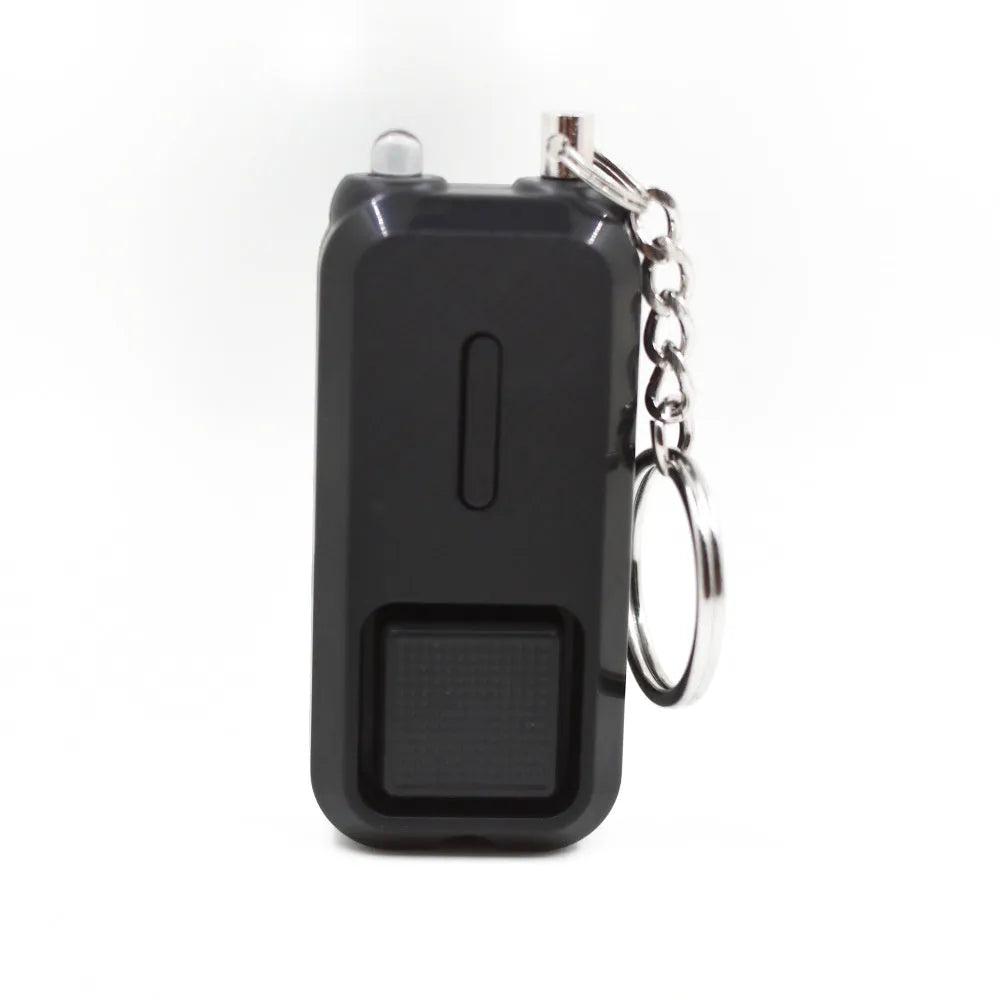 ZQ-202 personal safety alarm in pink, showing compact keychain-sized design.