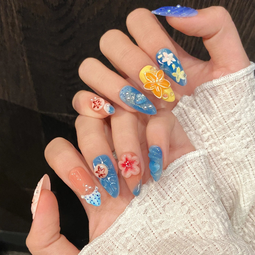 Three-dimensional carved jellyfish design on plastic wearable armour set in almond nail colour.