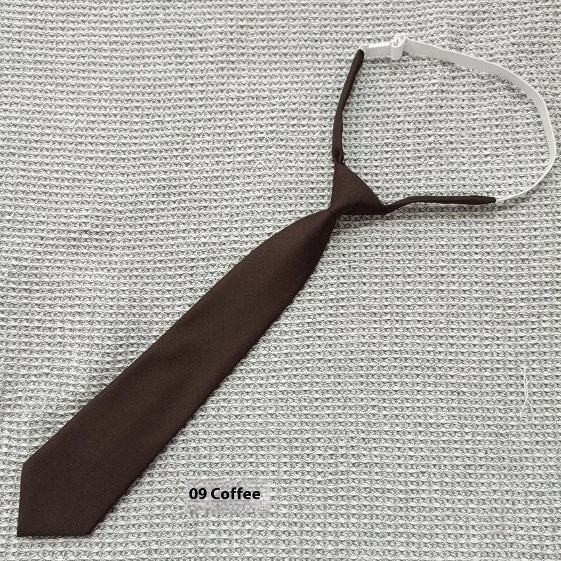 Navy blue cotton bow tie with arrow style design measuring 35cm by 7cm