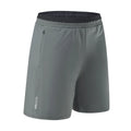 Men's Ice Silk quick-drying loose cropped running pants in army green on a model