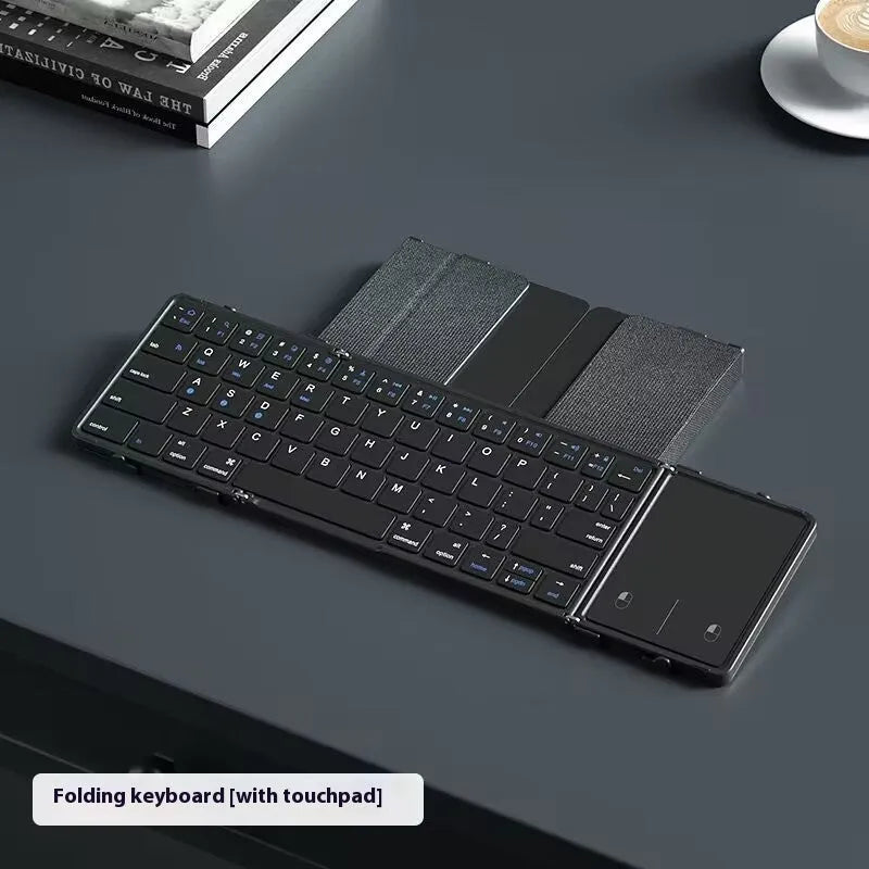 Black folding Bluetooth keyboard with touchpad for tablets and mobile phones