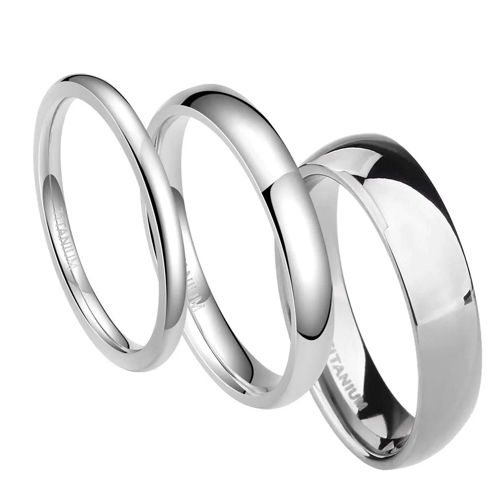 Silver pure titanium ring showing metallic finish and band width options on size guide