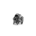 Close-up of a silver-toned alloy ring featuring a detailed one-eyed skull design on a finger.
