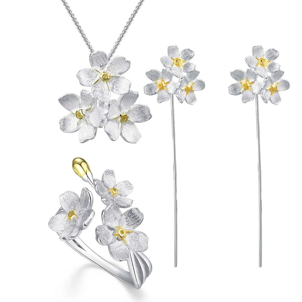 Sterling silver forget-me-not flower pendant with open mouth pastoral design