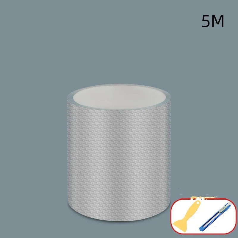 Roll of clear carbon fibre anti-collision film with scraper and utility knife for car door edges
