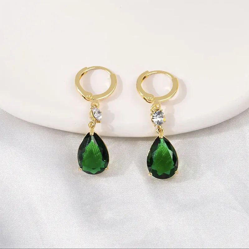 Geometric teardrop earrings in emerald green colour with alloy construction