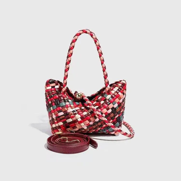 Women's casual handmade woven PU shoulder bag in colour, 18x11x14cm, on display