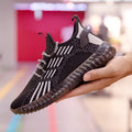 Men's white breathable flying fabric sports shoes with mesh lining and low-top platform design