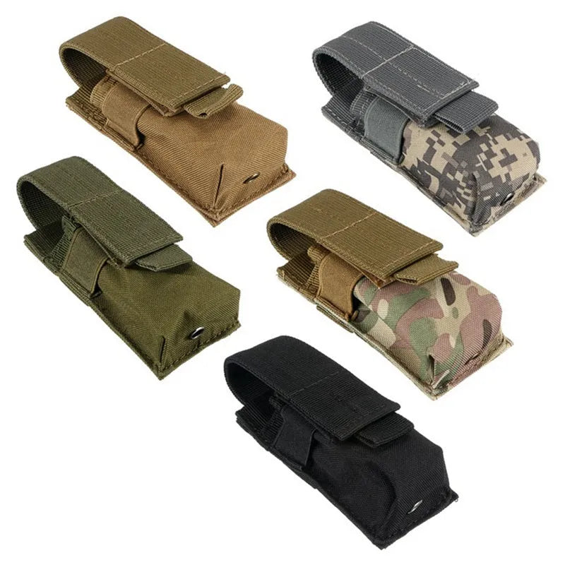 Black MOLLE tactical waistbag pouch for pistol cartridges and small flashlights on a belt.