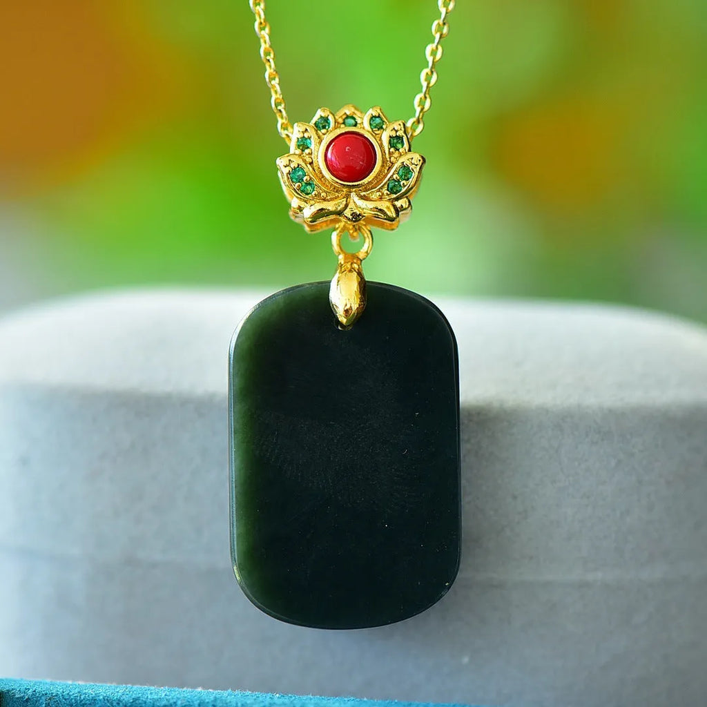 Natural Hetian gray jade pendant with copper inlay on a necklace chain