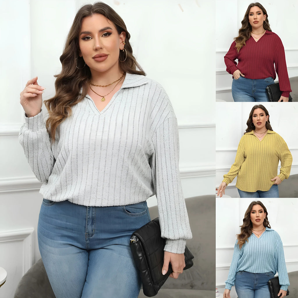 Women's plus size grey polar fleece shirt with a polo collar and lantern sleeves.