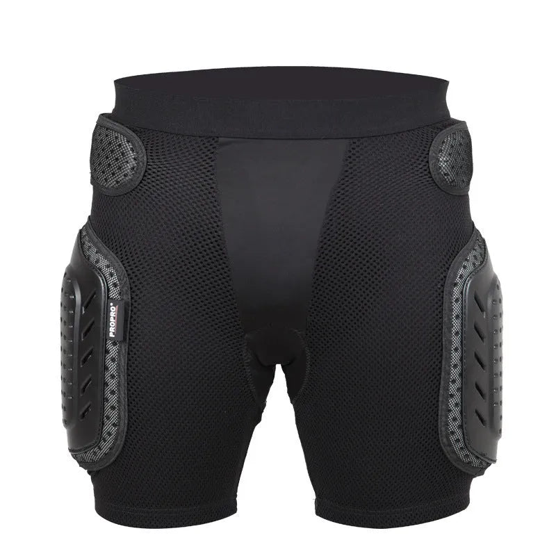 Black cycling hip protection pants showing the integrated protective pad, available in sizes S, M, L, and XL.