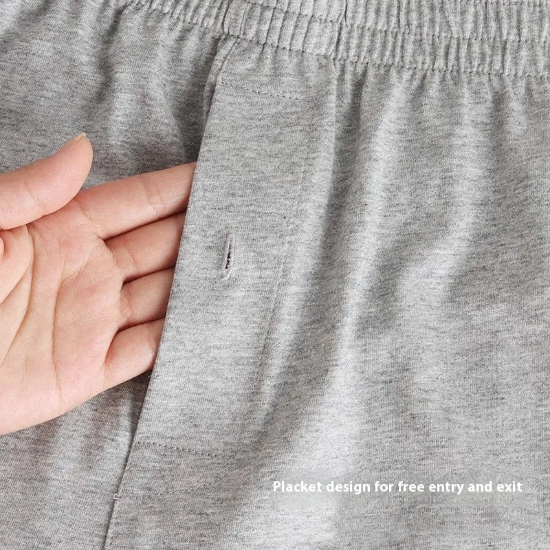 Men's high waist cotton boxer shorts in loose fitting design showing solid colour options
