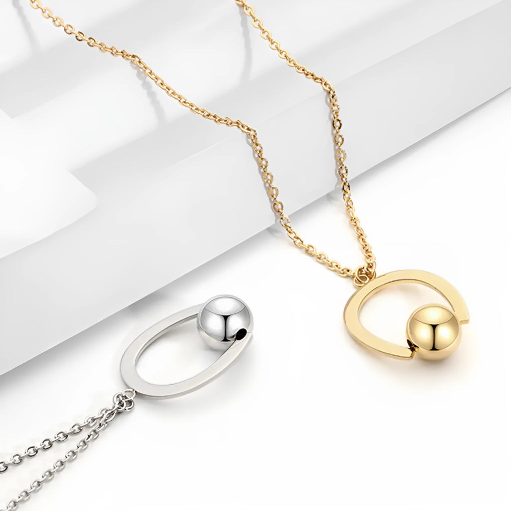 Adjustable stainless steel cross chain necklace with geometric pendant in gold or silver finish