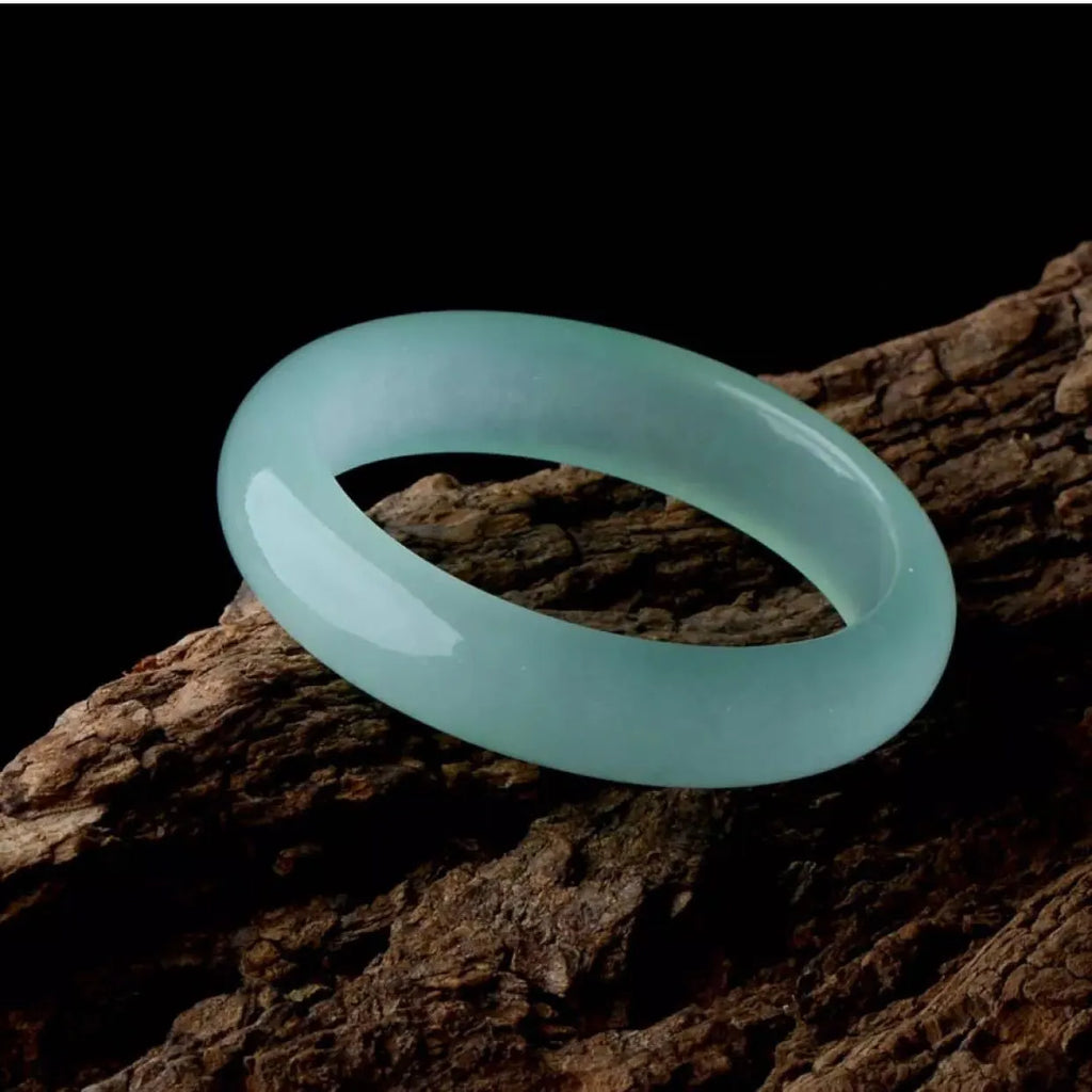Oil cyan light green quartz rock jade bracelet with smooth polished finish, modern simplicity style