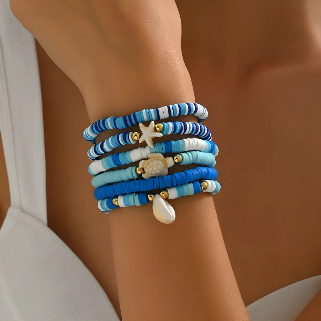 Set of six blue polymer clay handmade shell bracelets with geometric design, unisex bohemian style