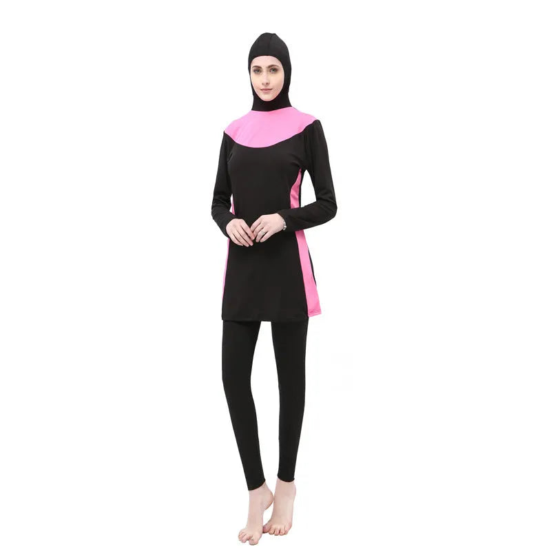 Conservative long-sleeved hooded women's swimsuit in black with coloured trim.