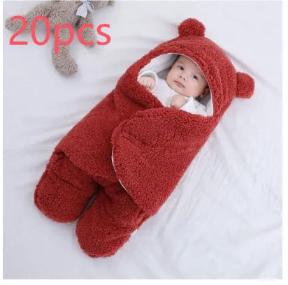 Baby quilted sleeping bag wrapper in cotton blend fabric with polyester cotton filling, shown in one of six colours