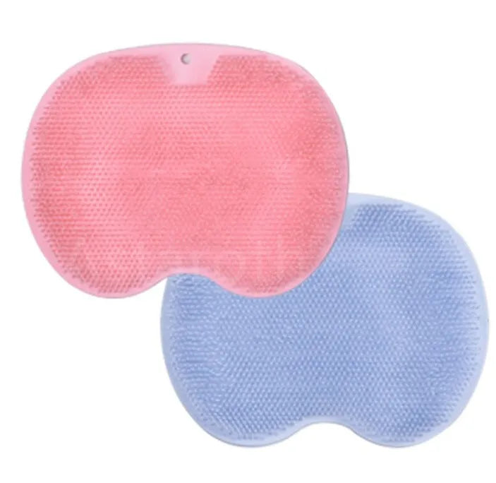 Non-slip bath mat with silicone bristles and suction cup base in a shower