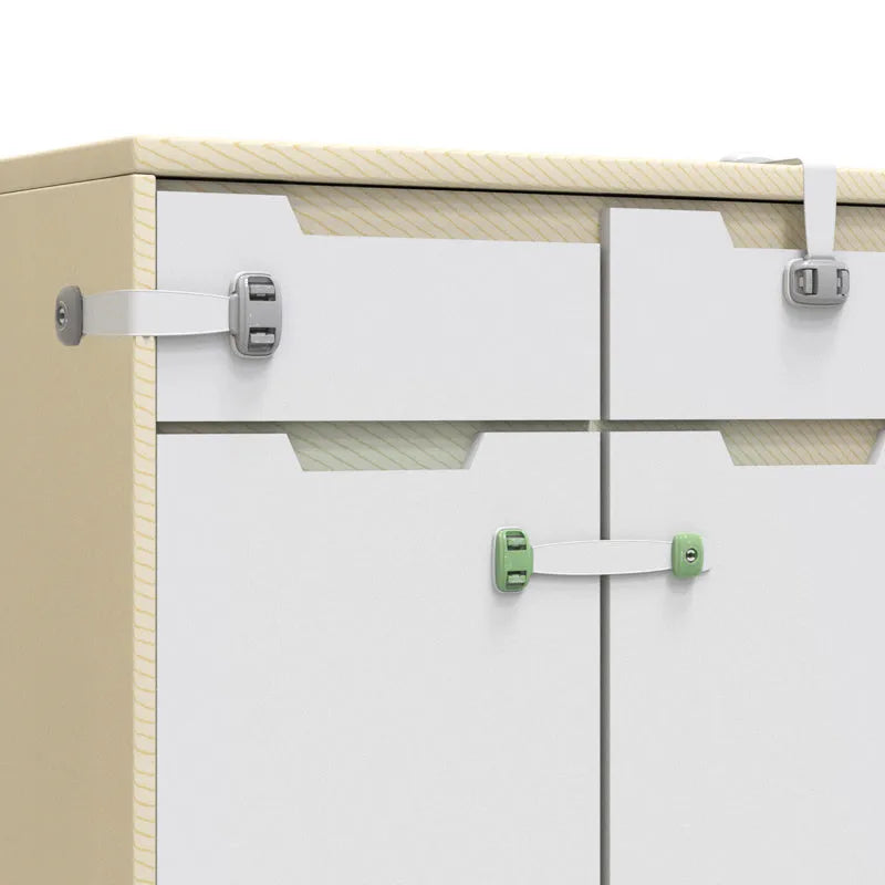 Gray child safety lock with adjustable strap attached to a cabinet handle, 53 x 112 x 16mm