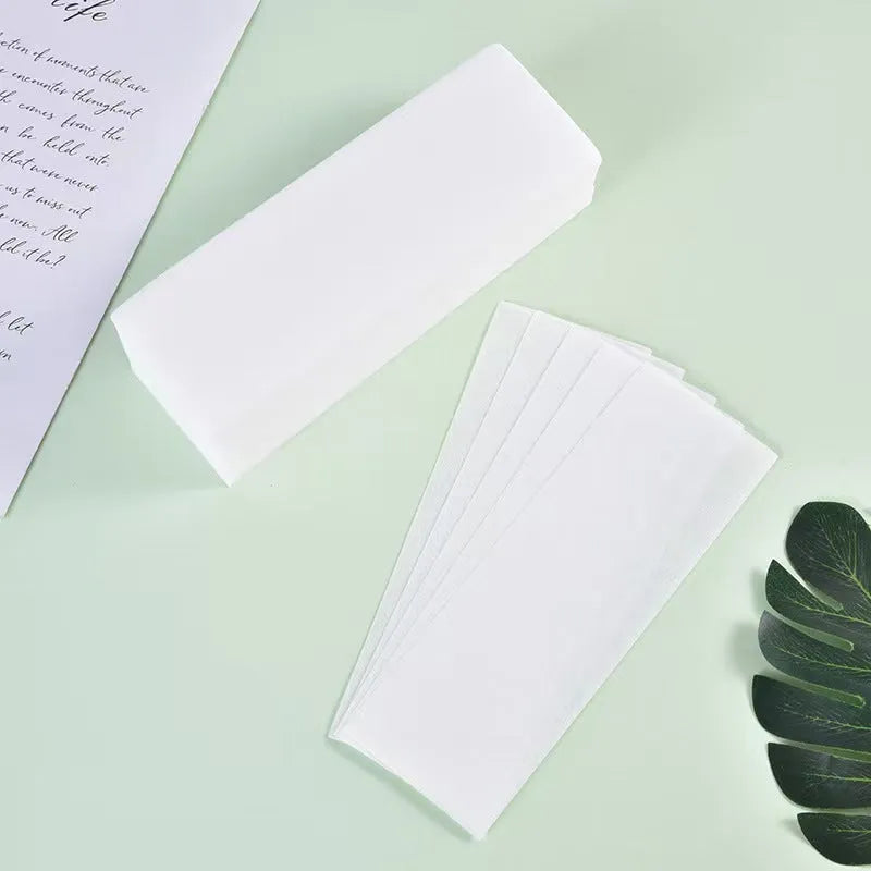 Non-woven hair removal wax strips in a pack for salon and home use