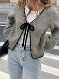 Women's solid colour lace-up cardigan with crocheted flowers, polyester knit, loose long sleeves
