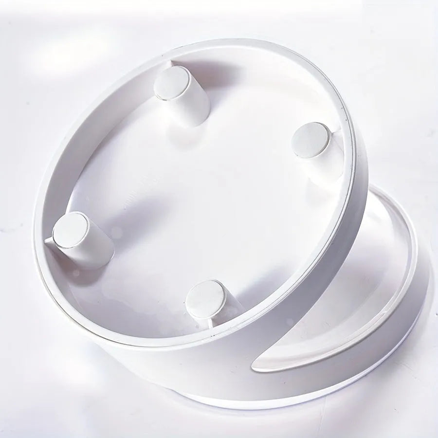 Clear plastic elevated cat food bowl with 15-degree tilt angle on white background