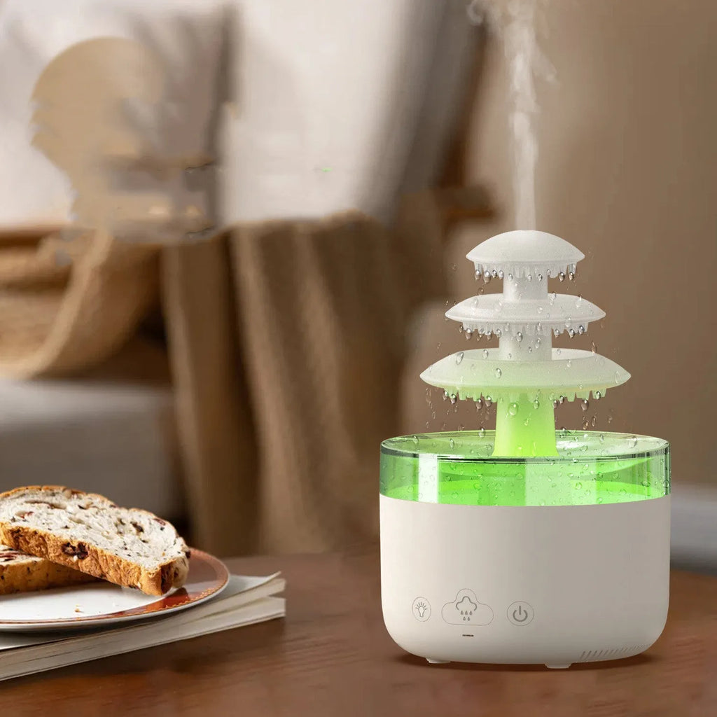 White plastic New Cloud Rain Air Humidifier with 500ml water tank and 7-colour atmosphere light on a wooden desk