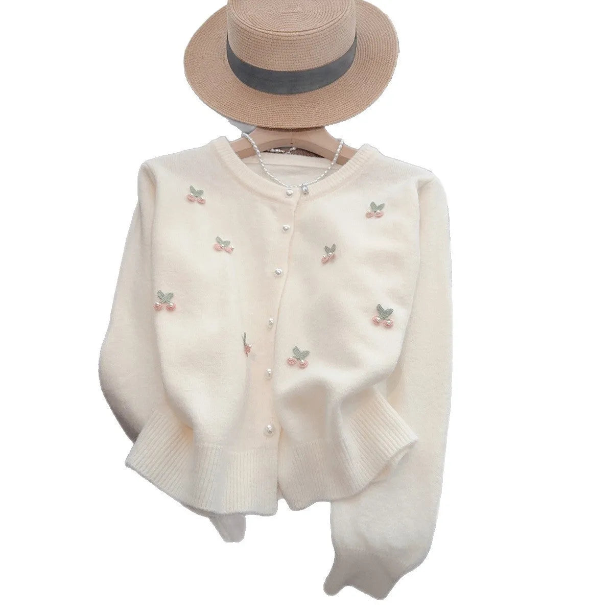 Cashmere blend slim fit cardigan sweater coat with beaded decoration on a hanger.