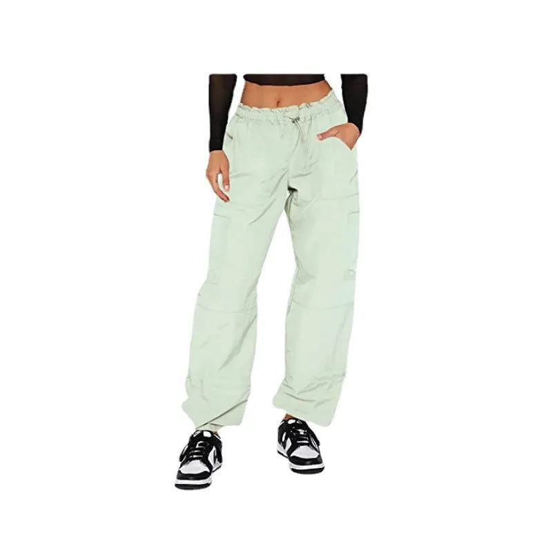 Men's loose-fit straight-leg cargo trousers in khaki with multiple pockets, showing the relaxed silhouette.