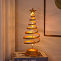LED Christmas tree spiral light ornament in iron, golden finish, 33cm tall, warm white glow on a tabletop