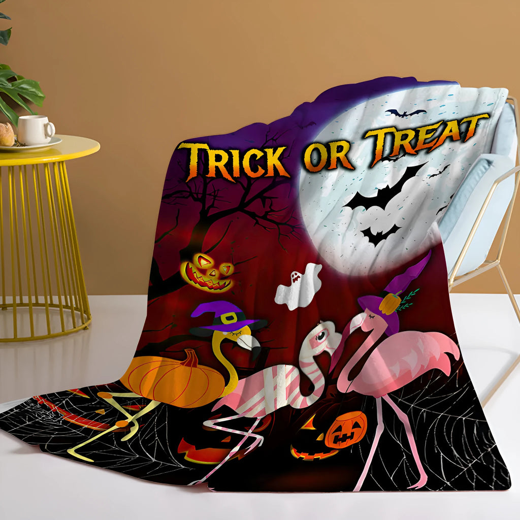 Purple flannel throw blanket with Halloween flamingo print, soft velvet texture, hemmed edges, available in multiple sizes