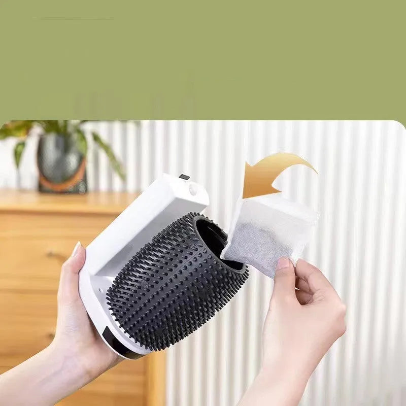 White automatic cat self groomer mounted in a wall corner with soft silicone bristles for grooming and massage