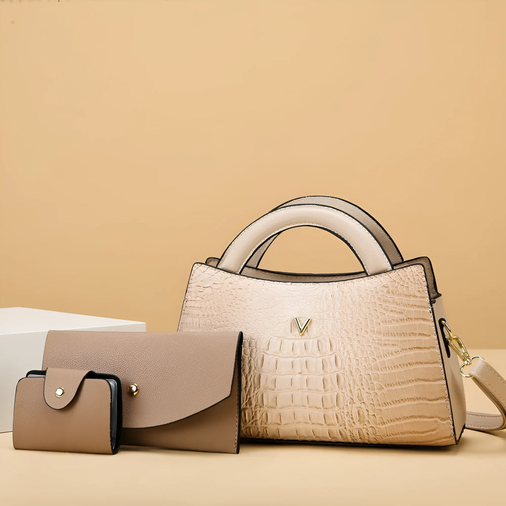 Women's black crocodile pattern PU leather crossbody handbag with gold hardware, shown open to reveal internal organiser pockets.