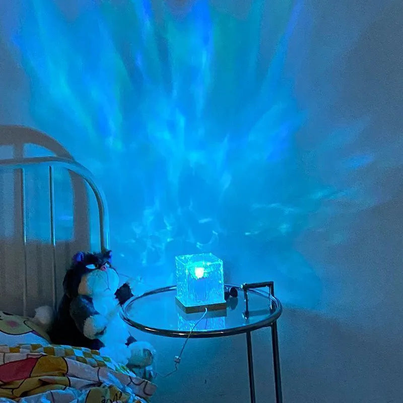 16-color LED water ripple night light with USB cable and remote control, crystal table lamp showing rotating projection on wall