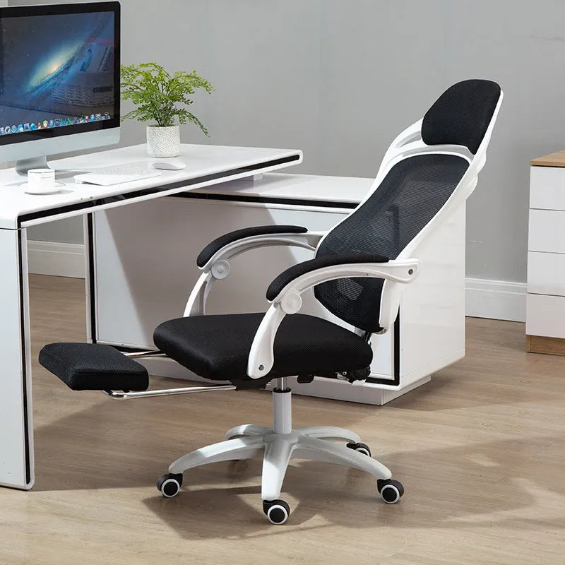 Ergonomic computer gaming chair in black with footrest and nylon wheels
