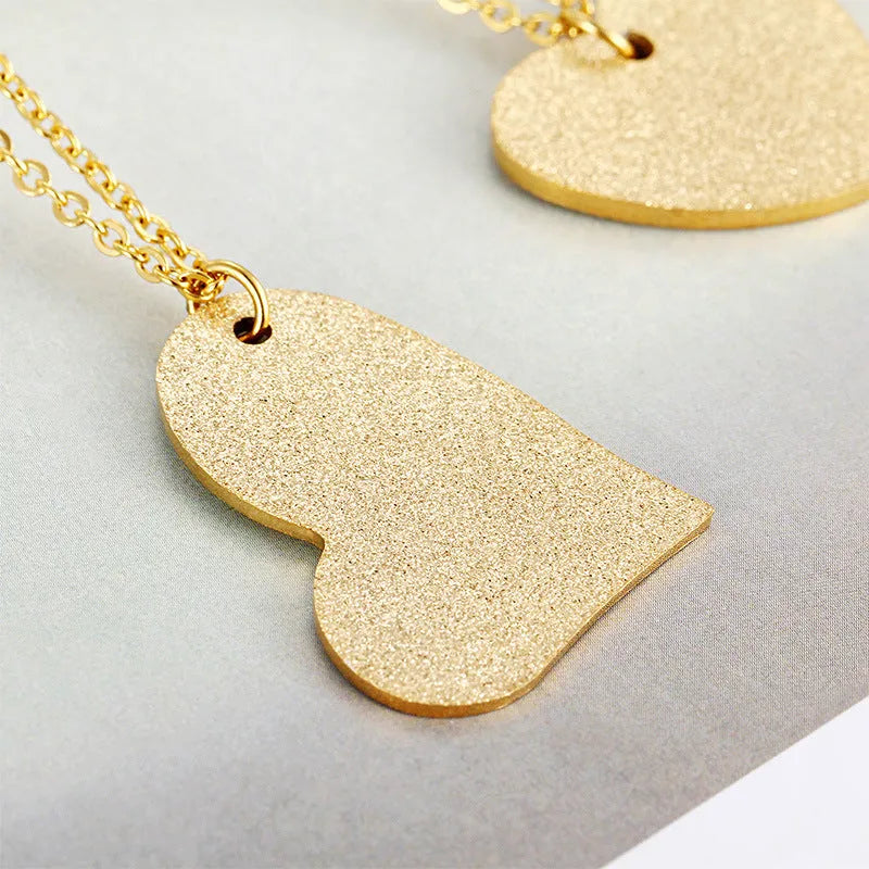 Women's geometric heart pendant necklace in titanium steel with minimalist design